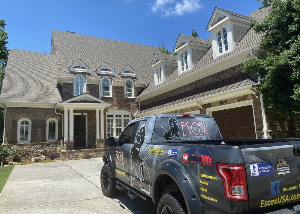 Slide of Escex Roofing and Restorations