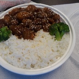 Sesame Chicken and White rice the spring roll didn't make it to the photo it was gone before I could think about it. Sesame Chicken and White rice the spring roll didn't make it to the photo it was gone before I could think about it.