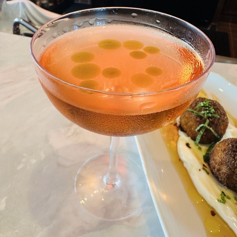 Gracie - Oaxacan Rose cocktail topped with Tarragon oil - Cocktail Bars Near Me - Santa Barbara, California Gracie - Oaxacan Rose cocktail topped with Tarragon oil - Cocktail Bars Near Me - Santa Barbara, California