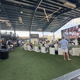 More seating options closer to stage with turf.