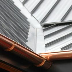 Horizon Roofing And Siding - Standing seam metal roof with copper gutters and downspouts