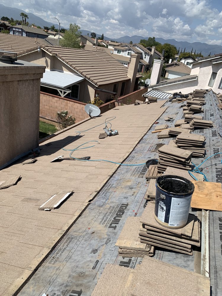 Slide of Ernestos Roofing