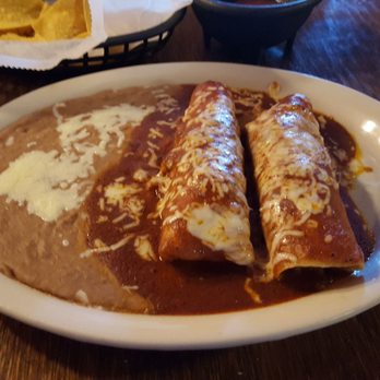 Azteca Mexican Grill - Enchiladas with red sauce and refried beans - Mexican Near Me - Camillus, New York Azteca Mexican Grill - Enchiladas with red sauce and refried beans - Mexican Near Me - Camillus, New York