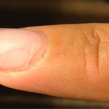 Laura's Nails - This is their idea of "fixing" one nail - Nail Salons Near Me - Santa Monica, California