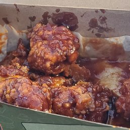 Boneless chicken bites with sweet and spicy sauce. Taste town. Boneless chicken bites with sweet and spicy sauce. Taste town.