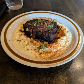 Grand Pied - Pork steak and dirty grits - Breakfast & Brunch Near Me - St. Louis, Missouri