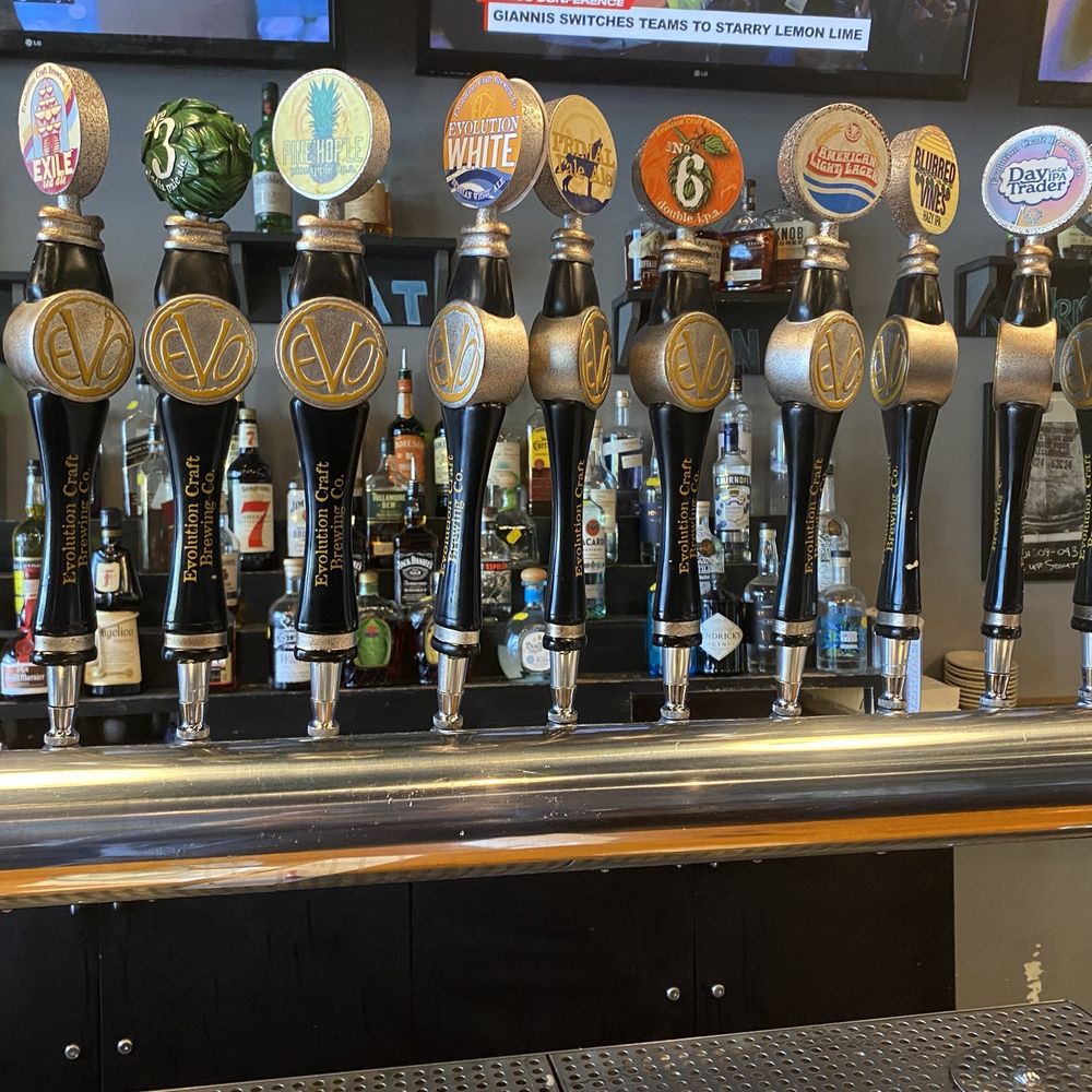 Evolution Craft Brewing Co. & Public House - Close up of taps available - New American Near Me - Salisbury, Maryland