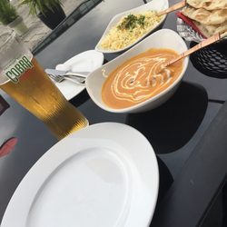 Pappadums Restaurant - Mm... Veggie dumplings, pillow rice, naan and a tall Cobra