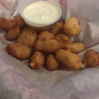 Ron's Place - Cheddar cheese curds with a side of ranch! We had eaten about half the order when I remembered to take a picture! - Pubs Near Me - Kenosha, Wisconsin