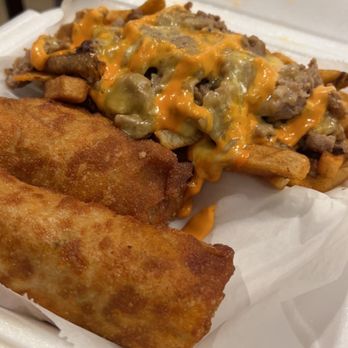 Lit Ass Wings - Philly and salmon Egg rolls with Philly fries - Caterers Near Me - Atlanta, Georgia