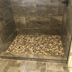 Renovation Rescue - Austin - Master shower floor . Renovation rescue added a shower drain that blends in .