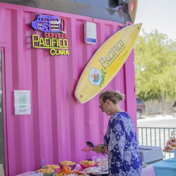 Bodhi’s Hideaway - a woman preparing food - Cocktail Bars Near Me - Austin, Texas