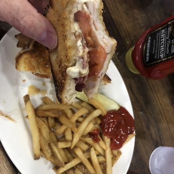 Boardwalk Bar & Grill - a sandwich and fries - American Near Me - Manistique, Michigan