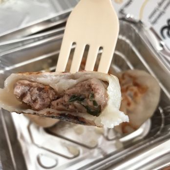 East Wind Snack Shop - The inside of an aged beef potsticker - Dim Sum Near Me - Brooklyn, New York East Wind Snack Shop - The inside of an aged beef potsticker - Dim Sum Near Me - Brooklyn, New York