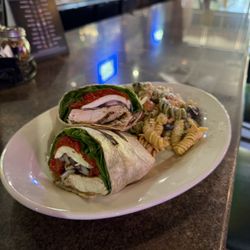 Uncle Louie's Pizza Lounge - Chicken Spinach Wrap!
Grilled Chicken, Spinach, Fresh Mozzarella, Roasted Peppers with Balsamic Vinaigrette.