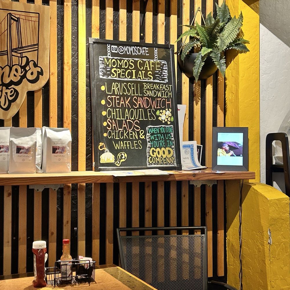 A bit of the decor and the specials. Also there is a tablet displaying various social media videos. A bit of the decor and the specials. Also there is a tablet displaying various social media videos.