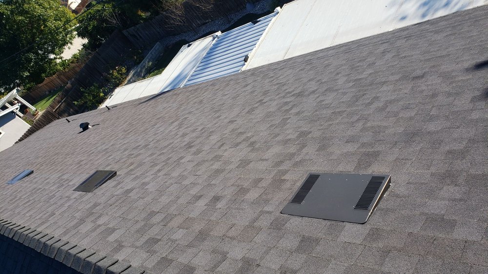 Slide of AE Roofing Experts