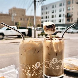 two iced coffees on a table