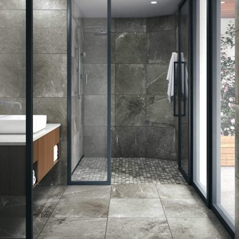 RPC Construction - a modern bathroom with a walk in shower - Tiling Near Me RPC Construction - a modern bathroom with a walk in shower - Tiling Near Me