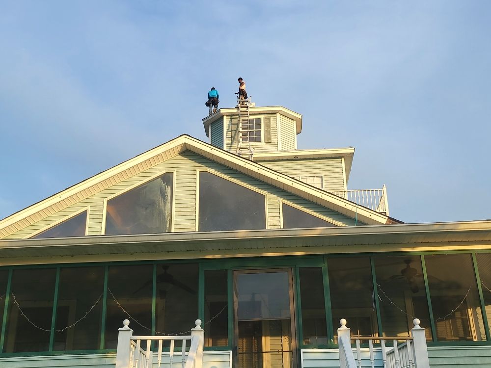 Slide of Anything & Everything Roofing