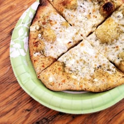 Camzies Pizza - Basil Pesto Pizza with Mozzarella & Feta Cheese from their wood-fired Pizza oven.