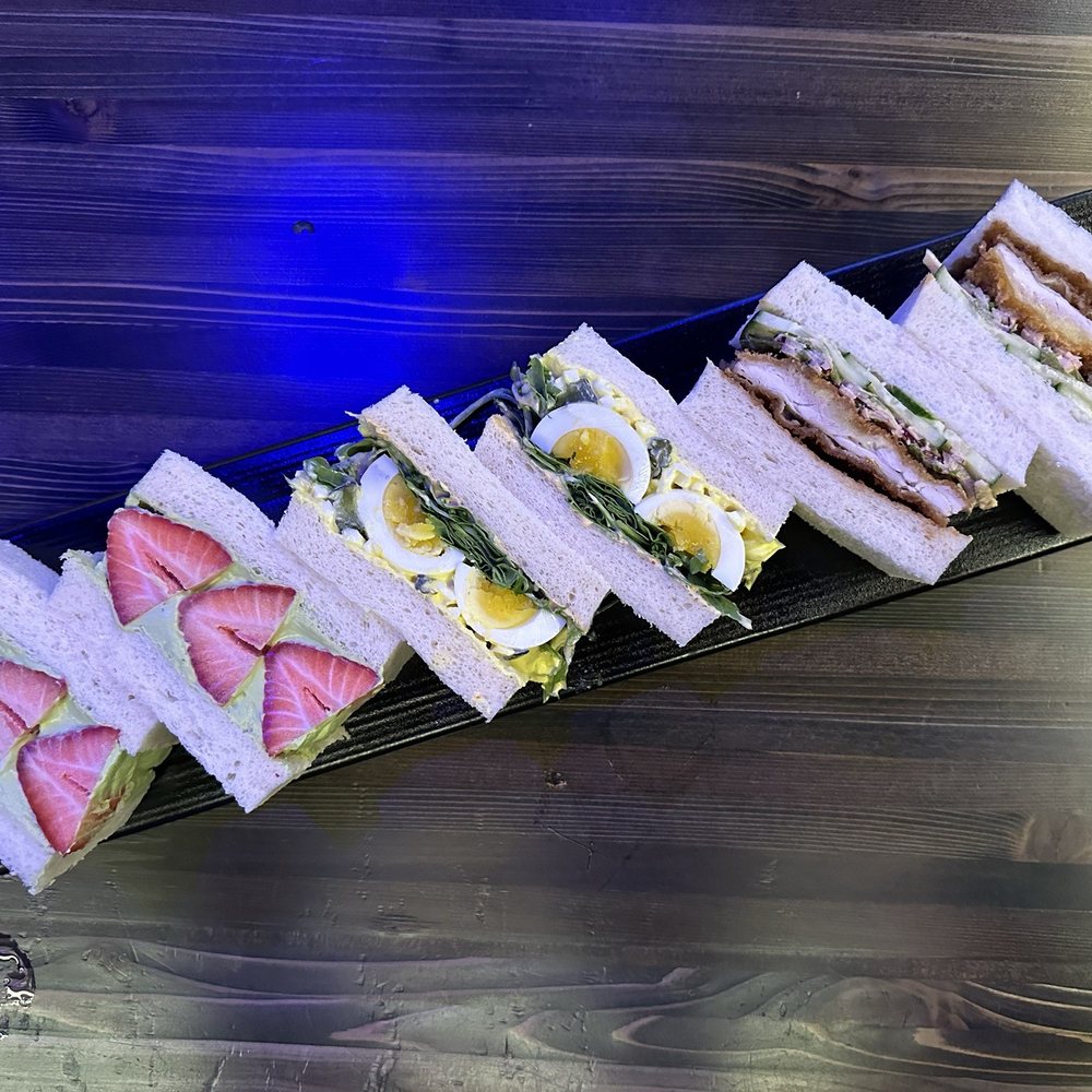 Yokocho - Set of 3 Sandos - strawberry matcha, deviled egg, chicken katsu - IG @bougiefoodieboi - Cocktail Bars Near Me - Chicago, Illinois Yokocho - Set of 3 Sandos - strawberry matcha, deviled egg, chicken katsu - IG @bougiefoodieboi - Cocktail Bars Near Me - Chicago, Illinois