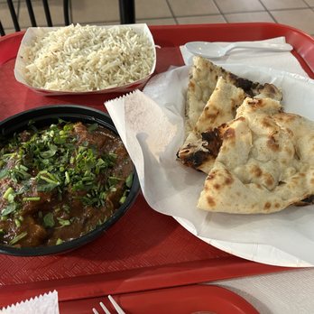 The Masala Taco - Goat Curry with fresh Naan and rice - Indian Near Me - Indianapolis, Indiana The Masala Taco - Goat Curry with fresh Naan and rice - Indian Near Me - Indianapolis, Indiana