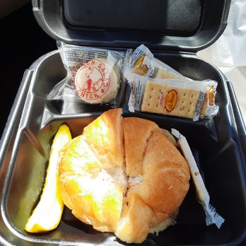 Chicken Salad Chick - "The Chick" - Classic chicken salad on a croissant with pickle, crackers and frosted, butter cookie ($9.29) - Southern Near Me - Ft. Myers, Florida