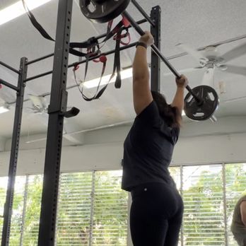 Parado Power - Doing an overhead strict press - Trainers Near Me - Honolulu, Hawaii