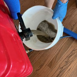 Mica Carpet & Upholstery Cleaning - The dirt extracted from our family room couch!