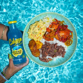 Amanda's Belizean Cuisine - Vida's Stew Chicken paired with a Calypso Ocean Blue Lemonade - Caribbean Near Me - Long Beach, California Amanda's Belizean Cuisine - Vida's Stew Chicken paired with a Calypso Ocean Blue Lemonade - Caribbean Near Me - Long Beach, California