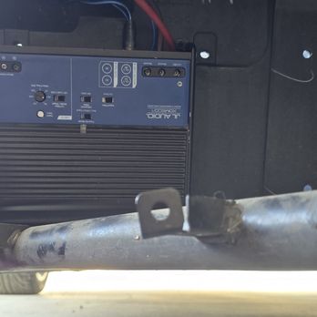 Audio Pros - amp mounted outside and he stole the cover to seal it, the wires were hanging and i had to temporarily tape them up so they would not drag - Car Stereo Installation Near Me - San Bernardino, California
