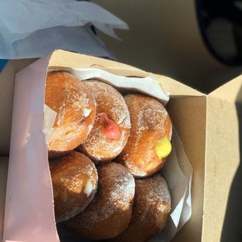 Leonard's Bakery - A half dozen malasadas- variety sampler - Bakeries Near Me - Honolulu, Hawaii