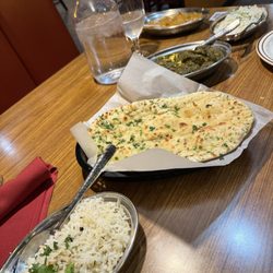 Red Fort Cuisine of India - Garlic naan, saag paneer, lamb coconut kurma