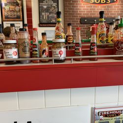 Hot sauces, most of them under 20% filled, and a selection of under 50% of what should be on display/selection. No more in the back.