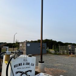 Helms and Son Grading & Excavating - We install concrete pole bases and set the light poles on pole bases.