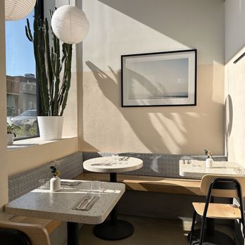 Two Hands - a corner of a restaurant with tables and chairs - Cafes Near Me - Brooklyn, New York Two Hands - a corner of a restaurant with tables and chairs - Cafes Near Me - Brooklyn, New York