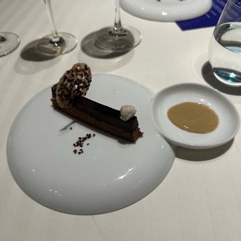 Restaurant Guy Savoy - Chocolate fondant, praline, chicory cream - French Near Me - Las Vegas, Nevada Restaurant Guy Savoy - Chocolate fondant, praline, chicory cream - French Near Me - Las Vegas, Nevada
