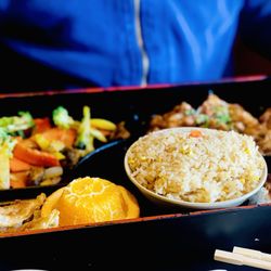 Kyoto Japanese Steakhouse & Sushi Bar - Hubby loves his Shoga Yaki Pork w/fried rice Bento Veggies were seasoned & cooked to perfection :)...