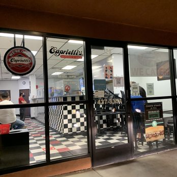 Capriotti's Sandwich Shop - You can't tell yet, but all the customers inside seemed to have been waiting an excessive time for their food. - Sandwiches Near Me - Henderson, Nevada Capriotti's Sandwich Shop - You can't tell yet, but all the customers inside seemed to have been waiting an excessive time for their food. - Sandwiches Near Me - Henderson, Nevada