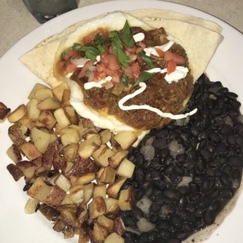 Wild Eggs - Chili Verde Huevos Rancheros... yum - Breakfast & Brunch Near Me - Fishers, Indiana Wild Eggs - Chili Verde Huevos Rancheros... yum - Breakfast & Brunch Near Me - Fishers, Indiana