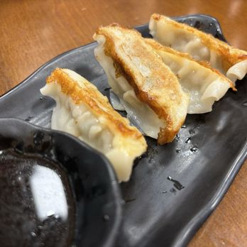 Ten Gu Ramen - Dumplings, after we ate a few! Very good, very fresh and not greasy. - Ramen Near Me - Oceanside, California