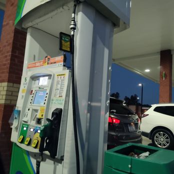 Publix - a gas pump and a car at a gas station - Grocery Near Me - Apex, North Carolina