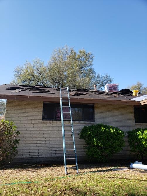 Slide of Luy's Roofing