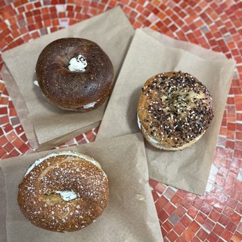 Bagelfeld's - Salt bagel with Lemon and Herb spread, everything bagel with plain spread, blueberry bagel with Honey Brown Butter spread - Bagels Near Me - Phoenix, Arizona