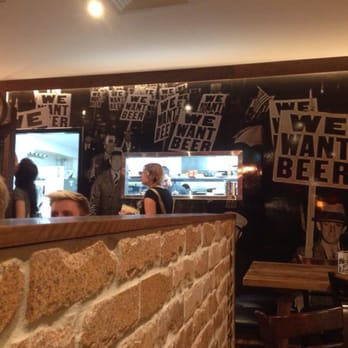 Southern Attitude - Prohibition photo on the back wall. - Cocktail Bars Near Me - Bulimba, QLD