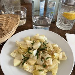 Endives with pear and walnuts drizzle with mustard seed vinaigrette.