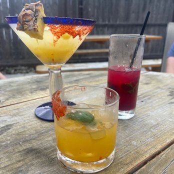 Hidden Hideaway Bar & Grill - Pineapple and jalapeños margarita, mango and jalapeño margarita and a London berry mojito. - Bars Near Me - Fredericksburg, Texas Hidden Hideaway Bar & Grill - Pineapple and jalapeños margarita, mango and jalapeño margarita and a London berry mojito. - Bars Near Me - Fredericksburg, Texas