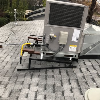 Efficient Energy Solutions - New Bryant Roof Top Gas Package Unit installed
Along with a Owens Corning 50 year warranty 
Cool Roof installed - Windows Installation Near Me - Sacramento, California