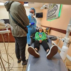 PhD Dental Inglewood - Dentist giving instruction to us